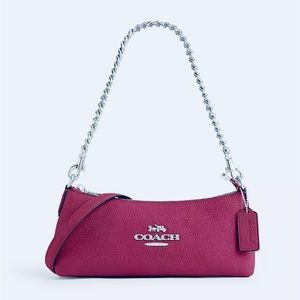 NWT Coach Charlotte Purse in bright violet, retails for $374.99.